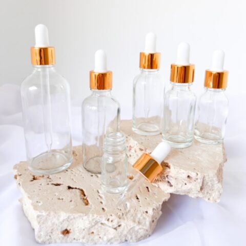 Clear Glass Bottles with Gold Dropper Tops